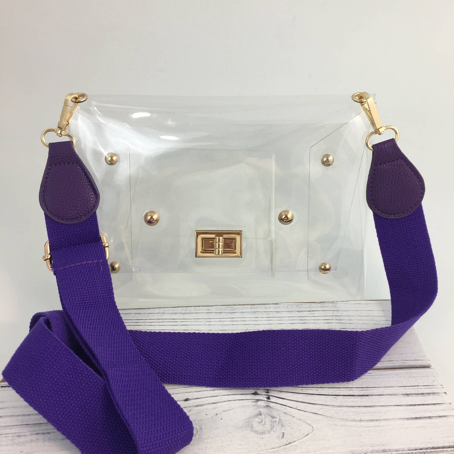 Clear purse with purple strap