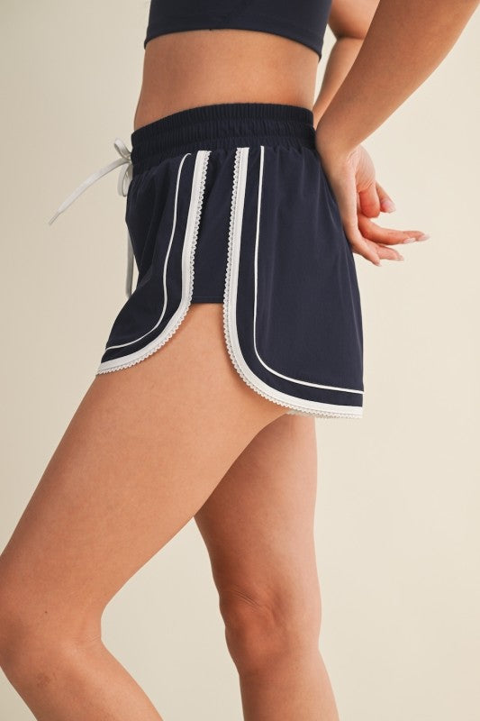 LACE TRIM RUNNING SHORTS