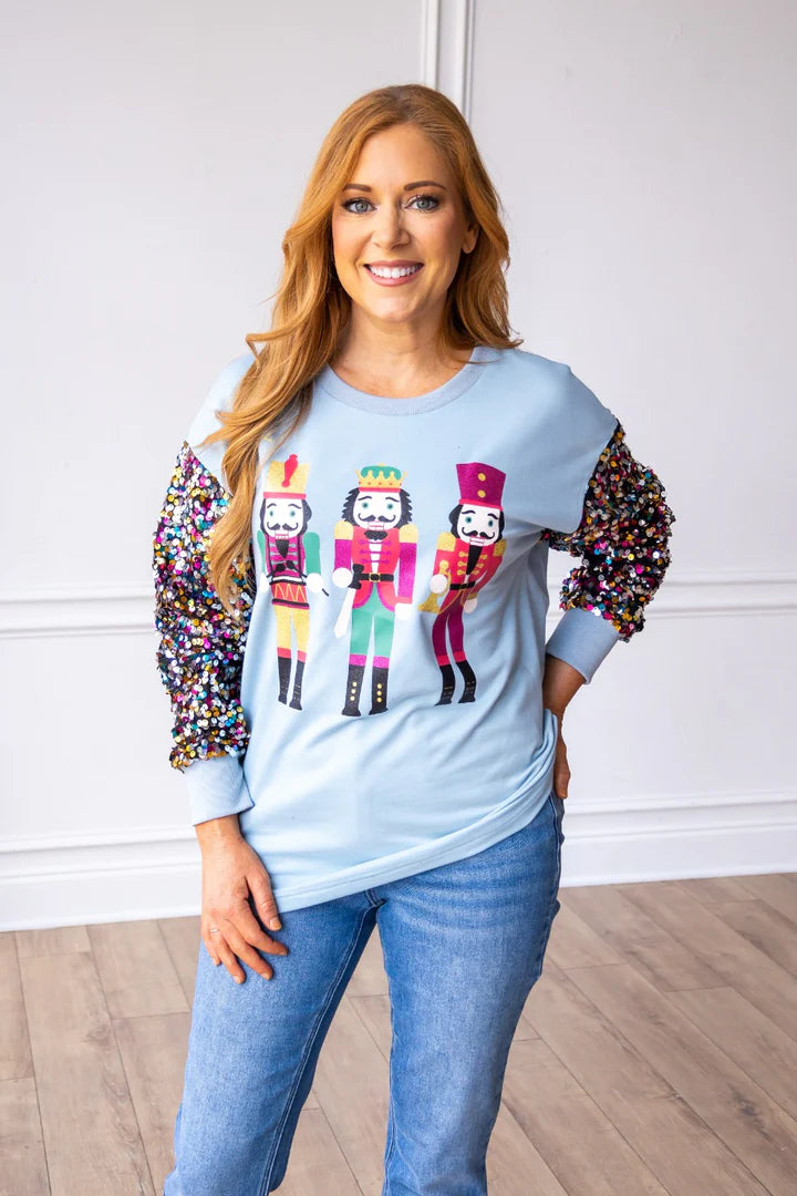 Nutcrackers Sequin Sleeves on Blue Sweatshirt