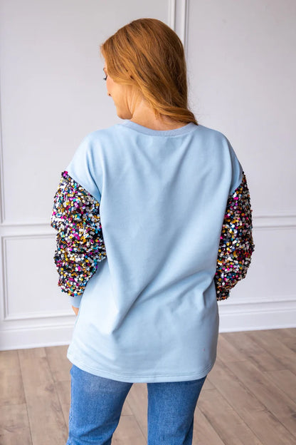 Nutcrackers Sequin Sleeves on Blue Sweatshirt